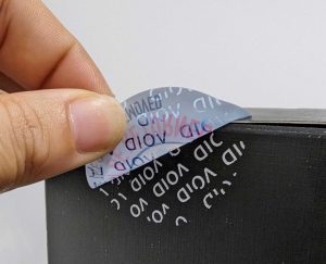 VOID and destructible security labels applied on packaging